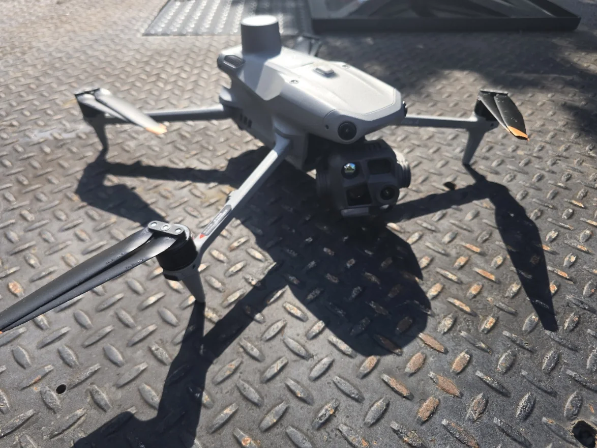 DJI Matrice 4T aircraft prepared on a diamond-plate trailer.