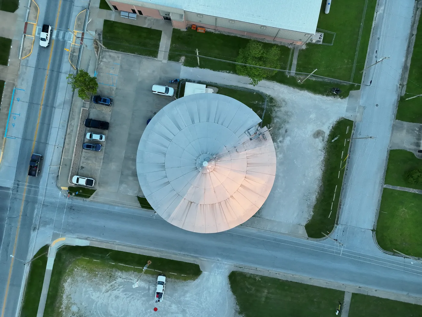 Top-down aerial view of the Bolivar water tower roof and surrounding streets.