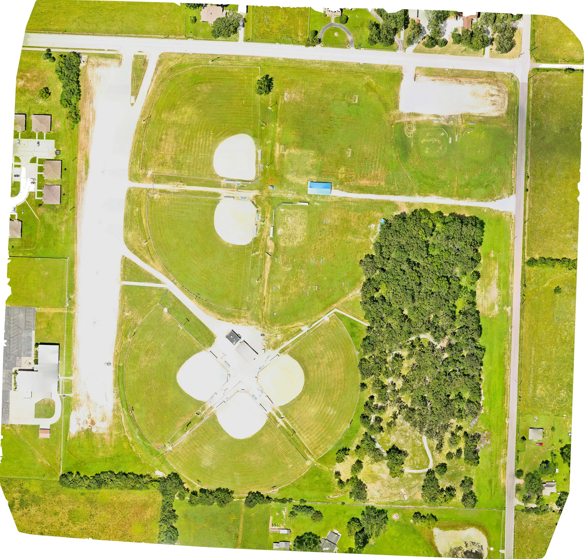 Overhead orthomosaic of Fullerton Ball Fields showing the recreation complex, parking areas, roads, paths, fields, and surrounding context.