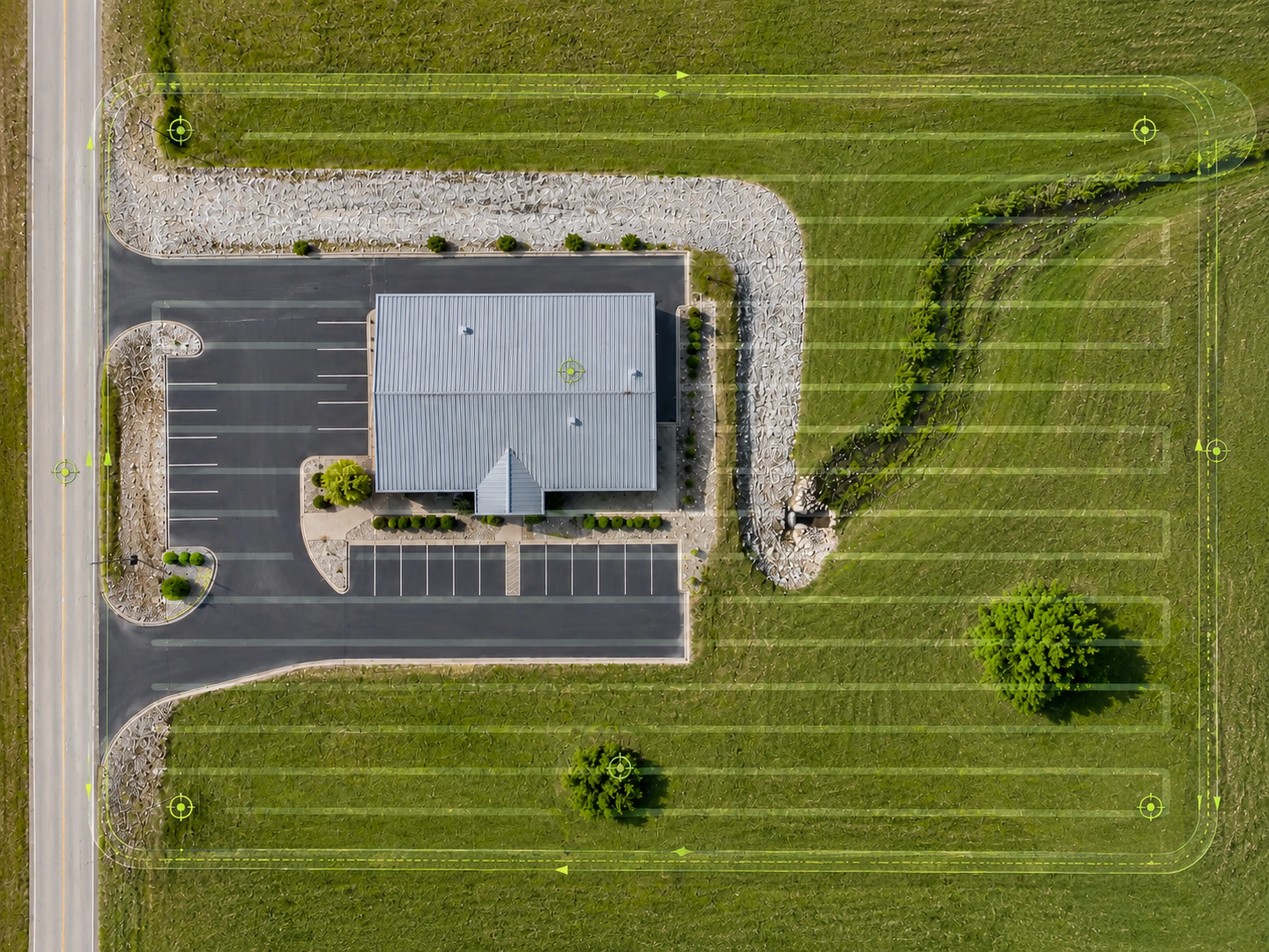 Orthomosaic flight planning overlay showing image overlap paths and control points over a commercial property.