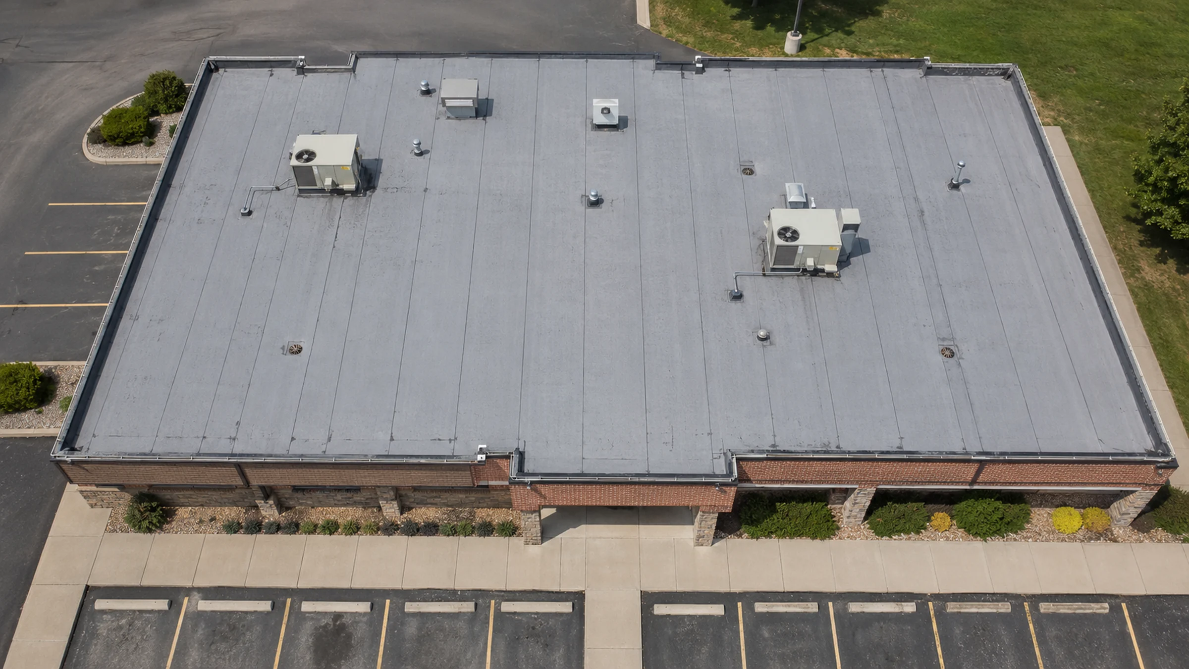 Aerial drone roof documentation image showing visible roof features on a commercial flat roof.